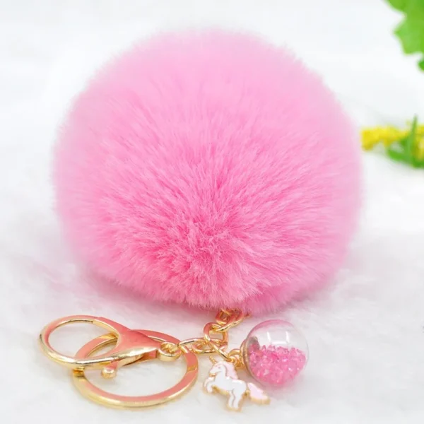 Llavero de unicornio con pompón de piel y colgante de cristal, accesorio mágico y colorido para llaves o bolso, ideal como regalo para amantes de los unicornios.